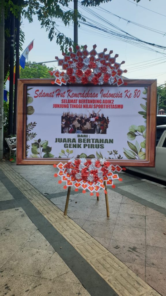 Karangan bunga digital tema kemerdekaan RI ke-80 dari Florist Demak, desain merah putih elegan untuk instansi dan komunitas.”
